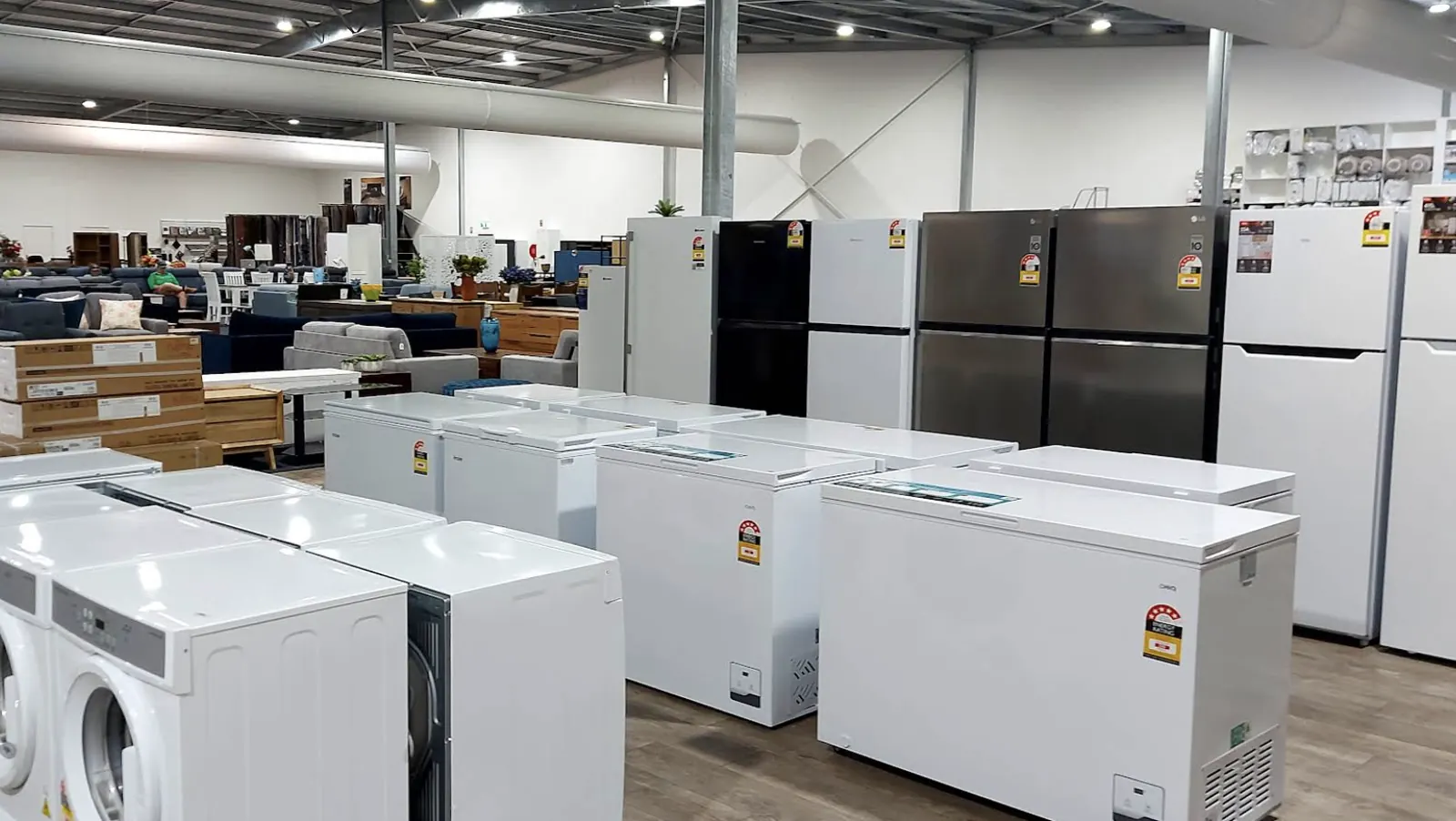 Fridges, chest freezers and washing machines on display in the Whitehouse Furnishers appliance showroom in Katherine
